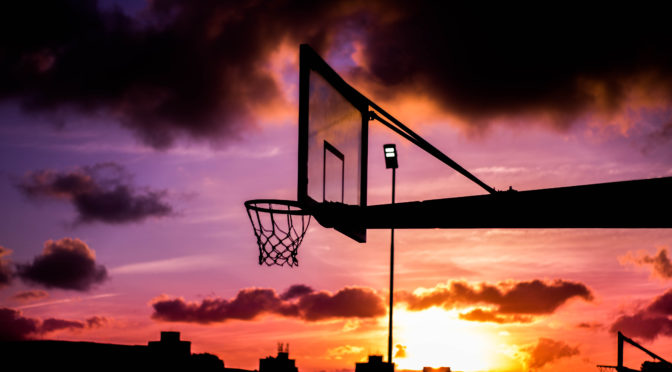 Outdoor Basketball Court in Evening